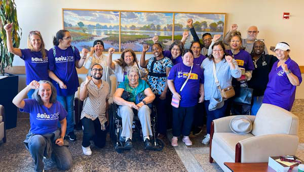 San Joaquin home care workers wearing purple in County Administration Building